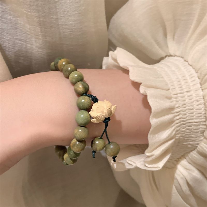 Pulsera Lotus borla sándalo verde