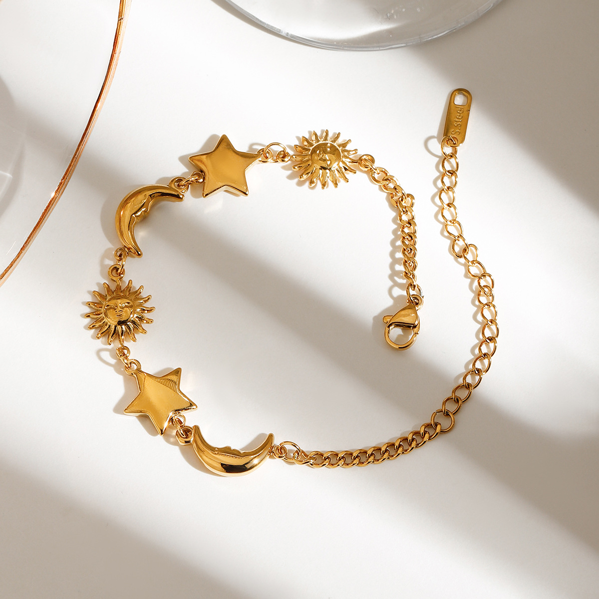 Wanxing Europa y los Estados Unidos 18K oro acero inoxidable estrellas luna playa vacaciones de verano y otoño viento DIY transfronterizo no desvanecer pulsera mujer