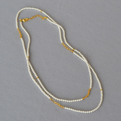 French-style minimalist Chanel-inspired high-luster small pearl chain multi-layer long pendant necklace for women to layer in autumn and winter