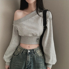 秋の新ホットガールオフショルダーショートスウェットシャツ女性のニッチイントレンディストリート多用途スリム長袖へそトップ