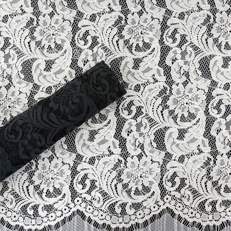 Tejido de encaje retro francés 2026 primavera y verano explosivo tejido de alta calidad para hacer vestido fábrica de tejido de encaje en stock