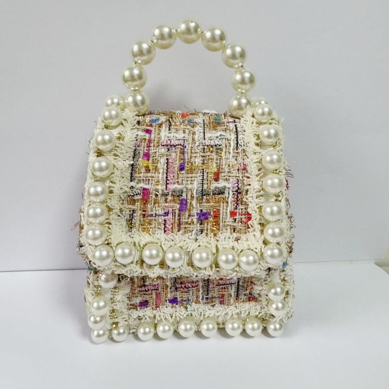 2025 primavera y verano estilo caliente moda casual niños dulces bolsa de gelatina mini bolso de mensajero de un solo hombro variedad al por mayor