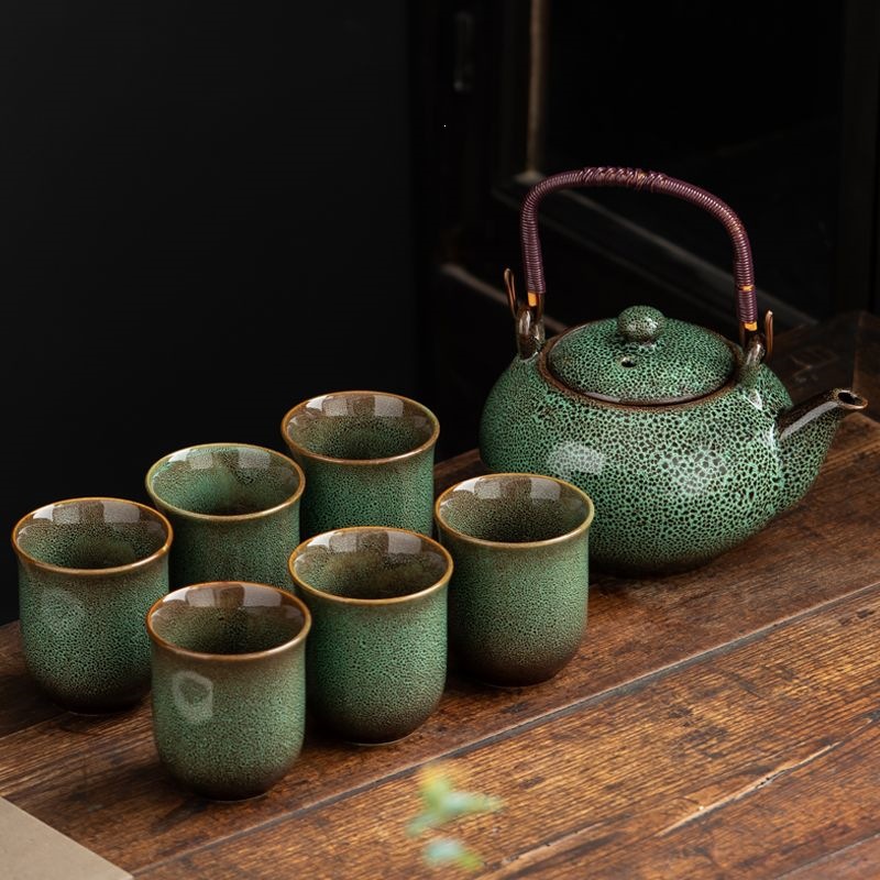 horno de alambre de dibujo de cerámica conjunto de tetera de té de siete cabezas tetera de viga doméstica sala de estar kung fu tetera de té de gran capacidad