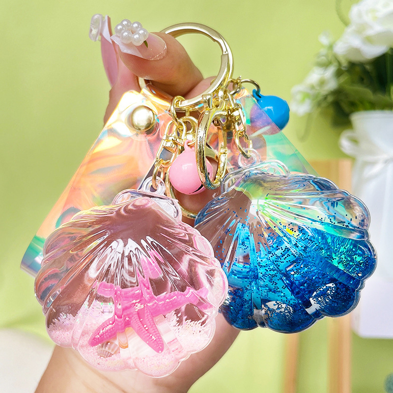 Creative acrylic starfish shell keychain fashion trend liquid quicksand pendant car bag accessories wholesale Creative acrylic starfish shell keychain fashion trend liquid quicksand pendant car bag accessories wholesale