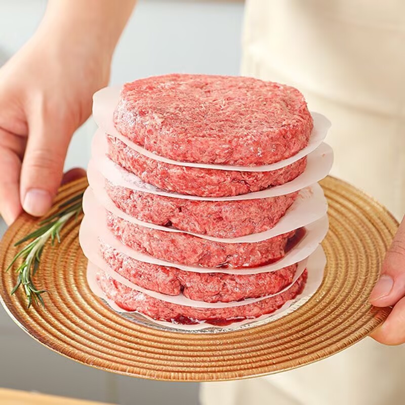 アマゾンの爆発的なハンバーガーは肉紙を押して円形のシリコン油紙を焼く|undefined
