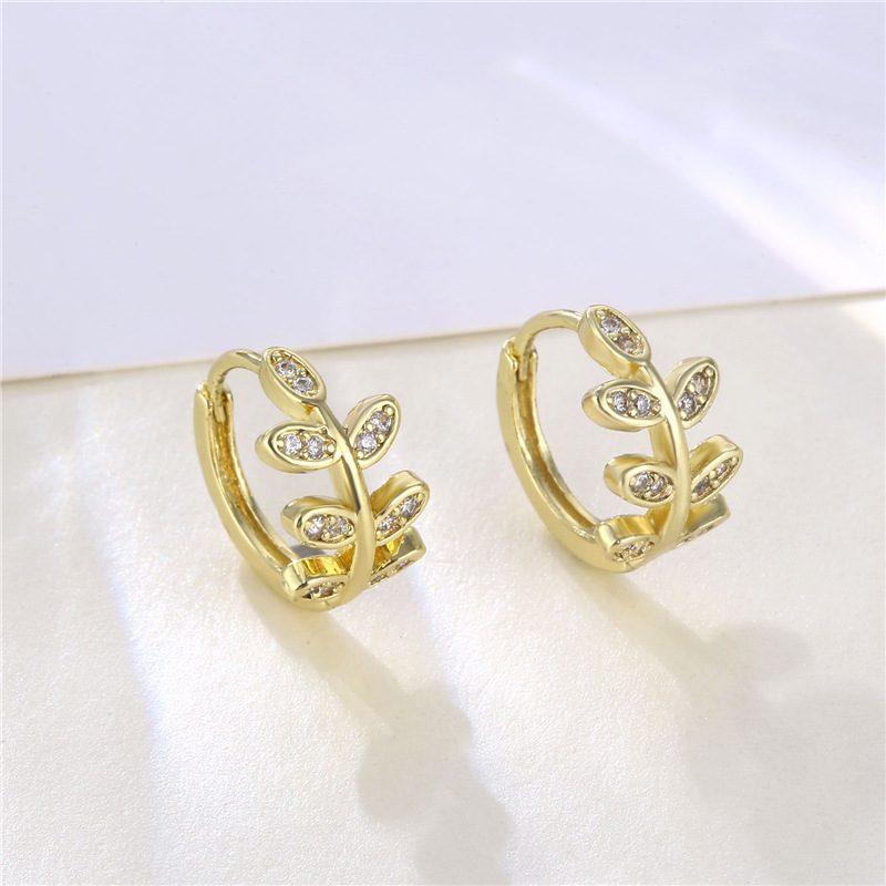 Wholesale Jewelry Hollow Leaf Copper Inlaid Zircon Earrings Nihaojewelry display picture 3