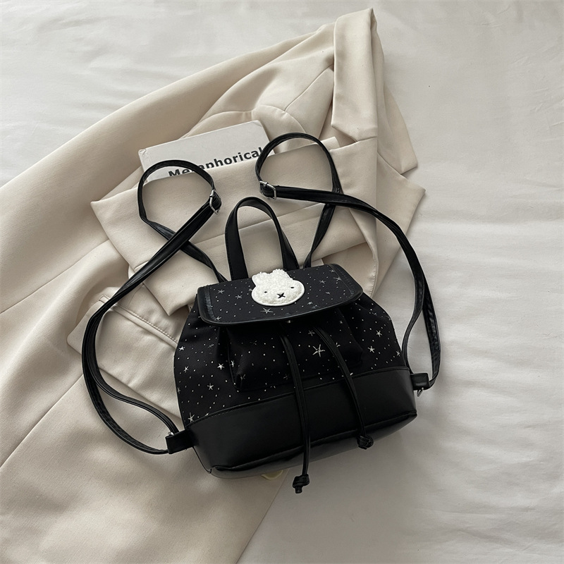 Mochila de moda coreana encantadora nicho femenino diario dulce estrella ondulado punto mochila de estudiantes mochila universal