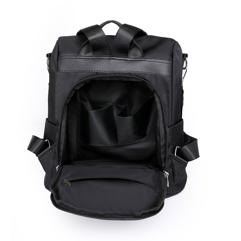 Comercio exterior al por mayor 2023 nueva mochila antirrobo de nailon para mujer casual moda contraste color mochila de viaje de doble uso marea