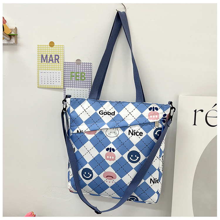 New nylon large-capacity hand-held student storage bag, cute cartoon outdoor bento bag, high appearance level single-shoulder women's bag undefined