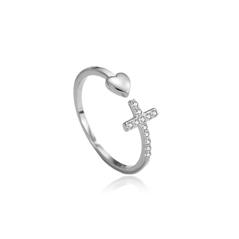 Anillo de amor cruzado europeo y americano Anillo abierto de diseño de nicho femenino Anillo de corazón de plata de ley 925 al por mayor