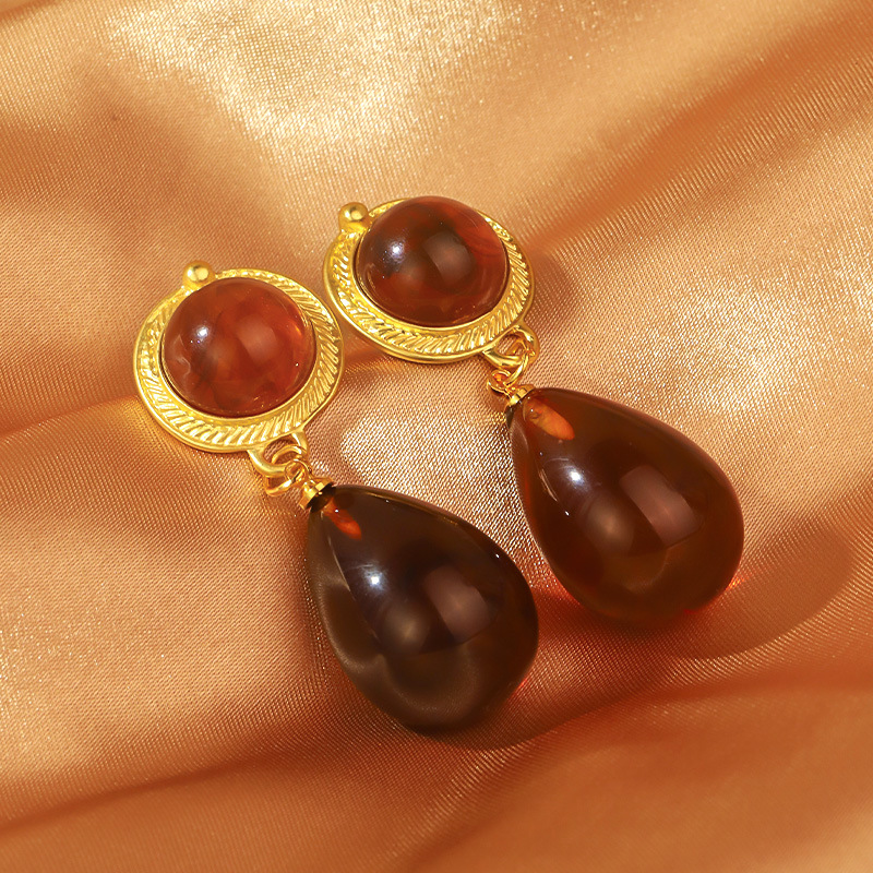 Retro ondulado ámbar aretes de gota de agua lujo ligero de alto nivel nicho super temperamento encantador pendientes franceses de moda europea y americana