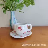 Двойная линия, бант — чашка и блюдце