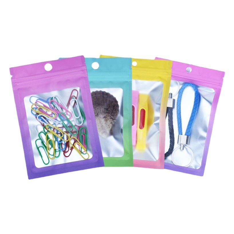 Gradiente Yin y Yang bolsa de hueso papel de aluminio de color láser ziplock bolsa pequeña bolsa de embalaje joyería juicio golpe púrpura bolsa sellada