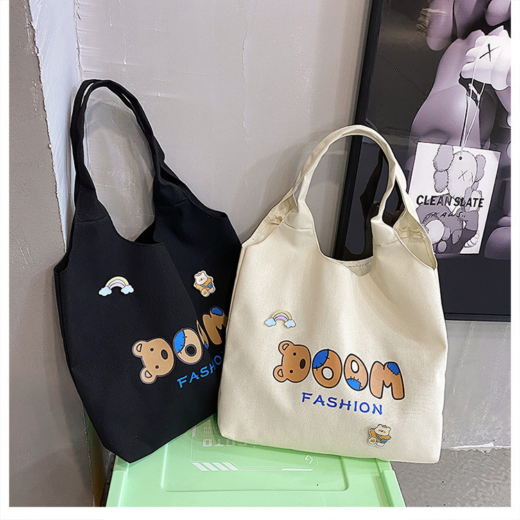2021 Summer Japanese-style simple canvas bag, student backpack, single-shoulder handbag for going out, cartoon badge cotton bag undefined