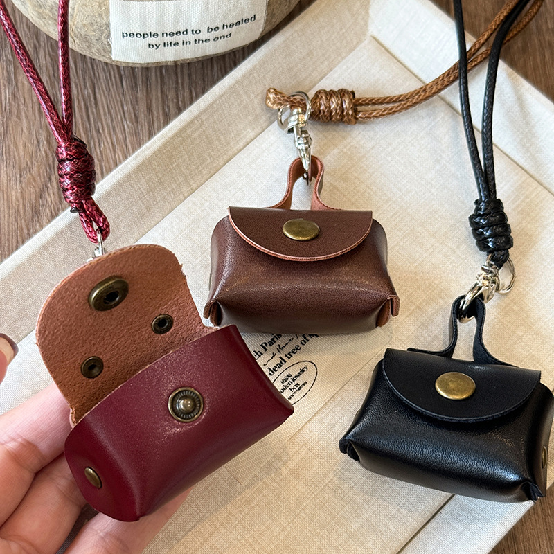 Bolso de auriculares de cambio de cuero retro collar de cuello colgante cadena de suéter de cercanías de todo fósforo sentido de alta calidad joyería retro al por mayor