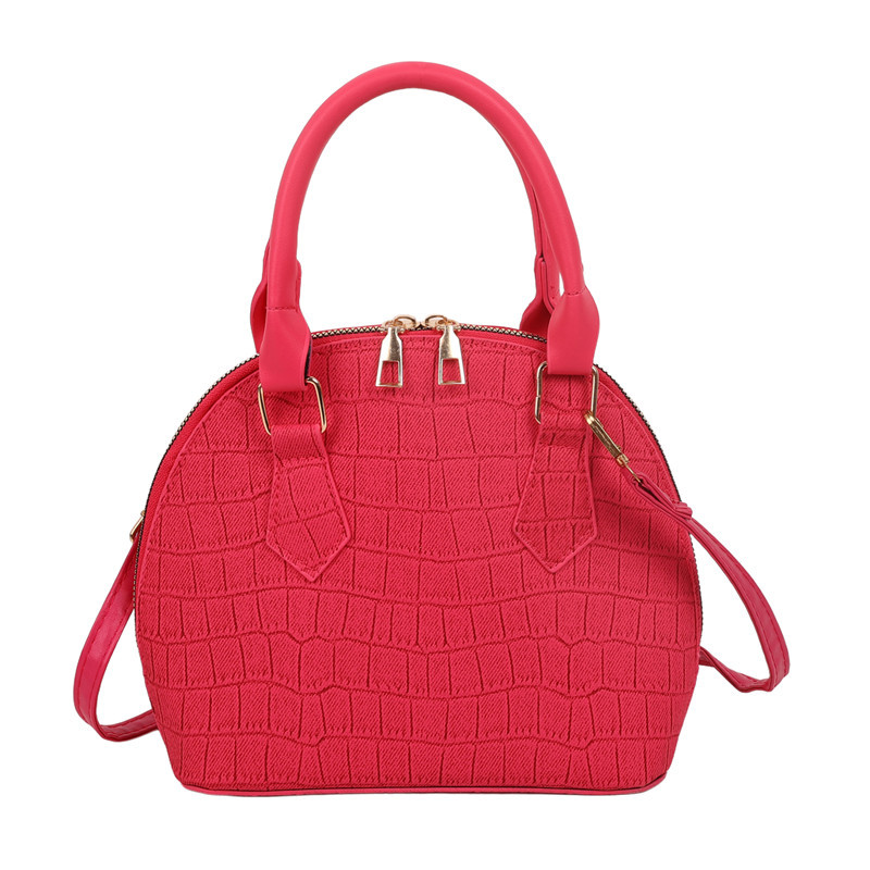 Bolso de mano de piedra para mujeres 2024 nuevo bolso de concha de textura bolso de hombro de moda minimalista estilo elegante mochila