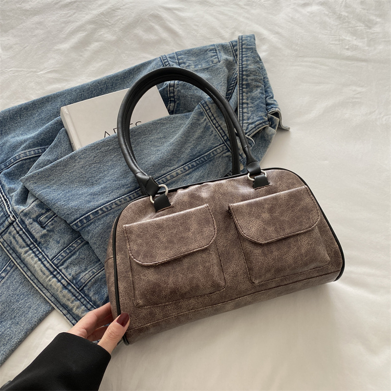 Bolsos para axilas de gran capacidad para viajeros otoño e invierno nueva moda retro nicho bolso de hombro casual de varios bolsillos