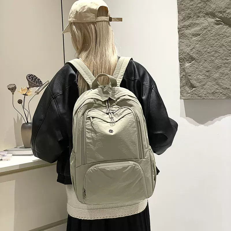 女式双肩包大容量休闲学生包多口袋旅行包时尚简约轻便牛津布书包
