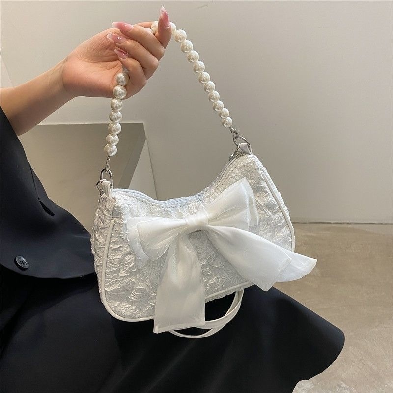 This year's popular bow-knot pleated bag for women, summer 2022 new trendy fashion pearl underarm bag, versatile shoulder bag