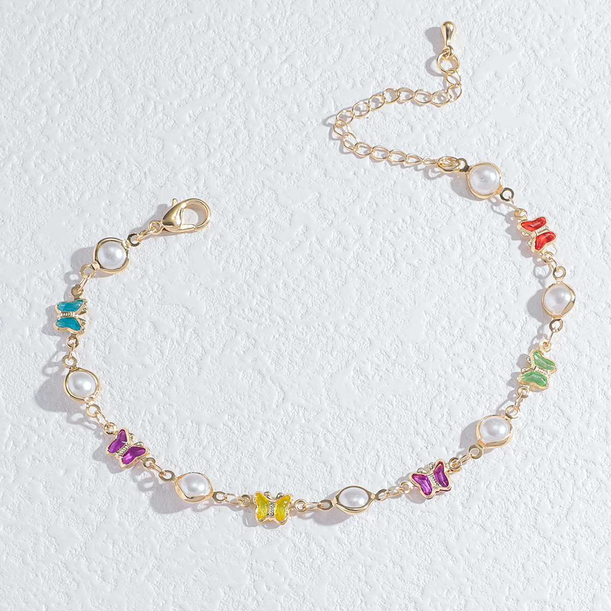 Fábrica directa de estilo bohemio personalidad goteo de flores de bronce pie adornamiento mujer simple versátil margarita correa de pie