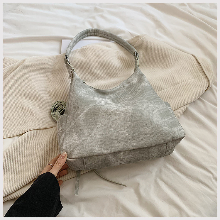 Large capacity wandering shoulder bag, new spicy girl high-end versatile double pocket strip casual crossbody armpit bag_voghion.com