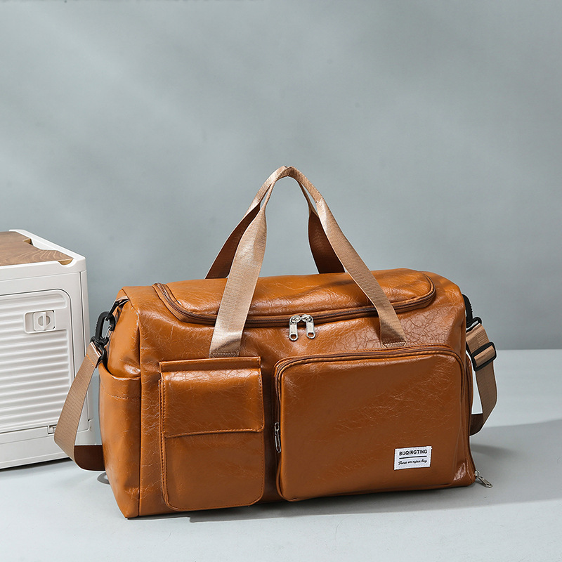 Nueva bolsa de viaje PU retro de gran capacidad portátil de viaje de hombres bolsa de ocio bolsa de gimnasio