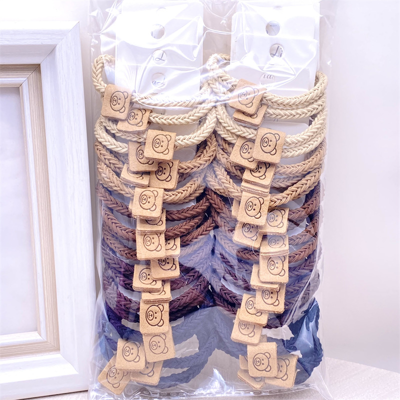 Descuento 4 tarjetas estilo coreano leche té color lindo paño etiqueta banda de pelo banda de goma de las mujeres del lazo del pelo cuerda de pelo 2 yuanes tienda accesorios