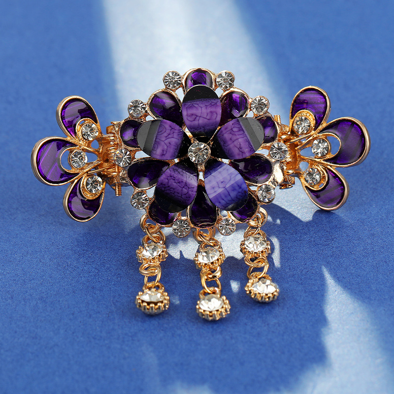 purple diamond five-petal flower