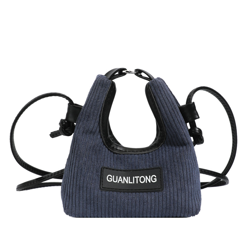 Bolso de niña de color sólido coreano lindo mini mochila de bebé otoño invierno nuevo bolso de hombro para niños de lana