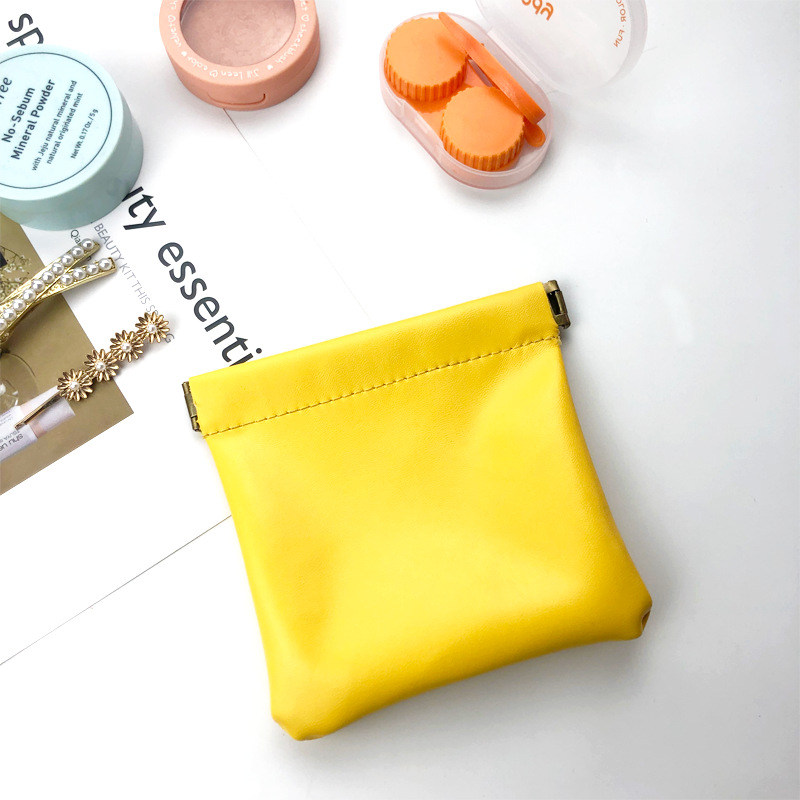 Venta al por mayor de cuero servilleta sanitaria lápiz labial bolsa de almacenamiento de metralla bolsa de almacenamiento mini ins estilo pu cuero pequeño monedero