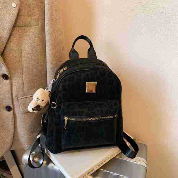 Retro lujo ligero leopardo mochila de nicho ligero de gran capacidad mochila de viaje de mujer bolsa de viaje