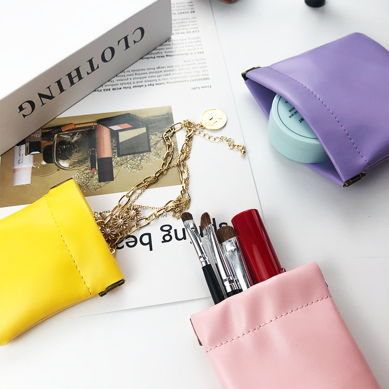 Venta al por mayor de cuero servilleta sanitaria lápiz labial bolsa de almacenamiento de metralla bolsa de almacenamiento mini ins estilo pu cuero pequeño monedero