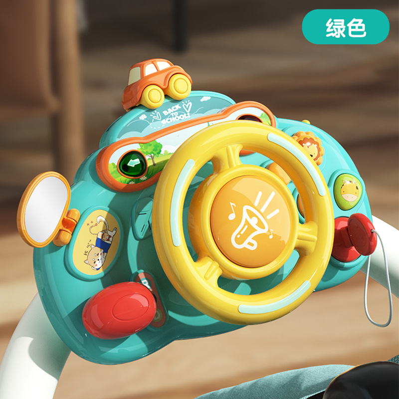 子供のハンドルのおもちゃはシミュレーションして車の後部座席の自動車の赤ちゃんの赤ちゃんの女性の男の子を運転します。