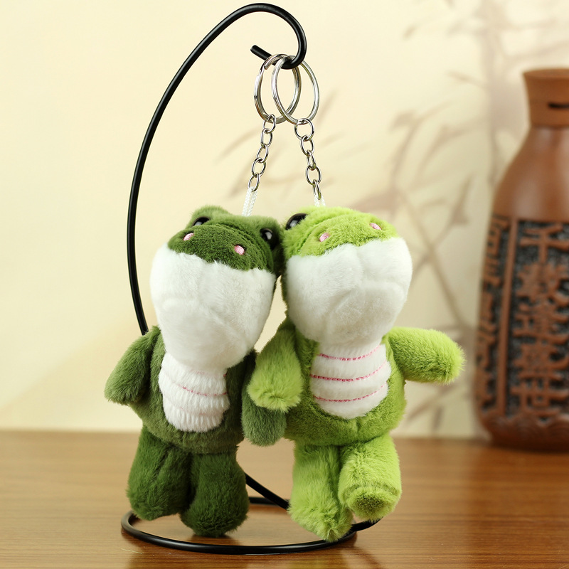 Red de celebridades lindo cocodrilo peluche colgante pequeño dinosaurio bolso llavero muñeca colgante cocodrilo muñeca muñeca