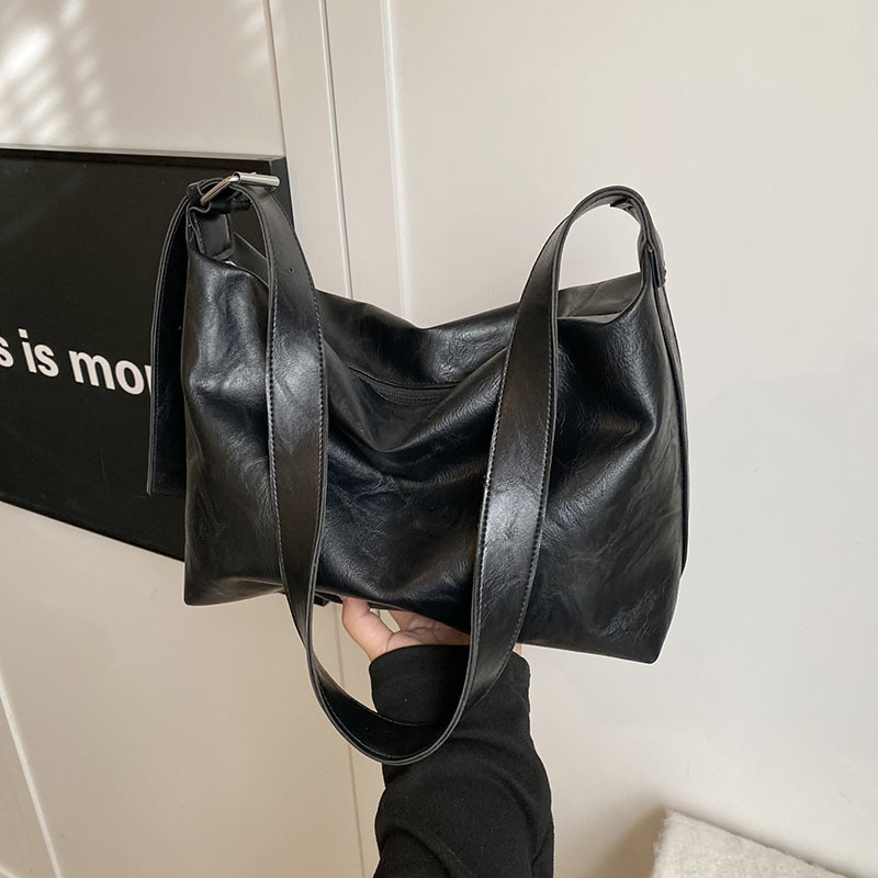 Bolso de gran capacidad relajado retro primavera 2025 nueva moda mochila de hombro textural bolso de dumpling damas