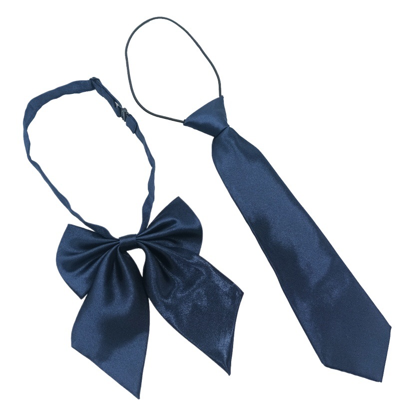 Fábrica en stock al por mayor de los niños corbata pajarita traje Escuela Primaria estudiantes de secundaria de color sólido a rayas corbata pluma raíz pajarita