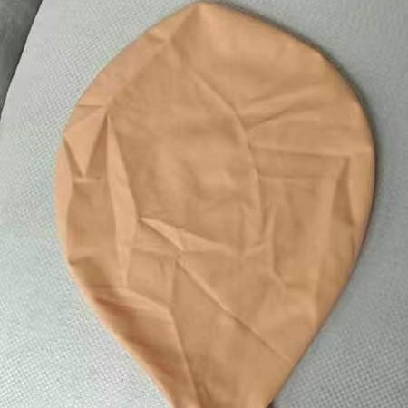 Большой плоский макарон оранжевого цвета размером 36 дюймов