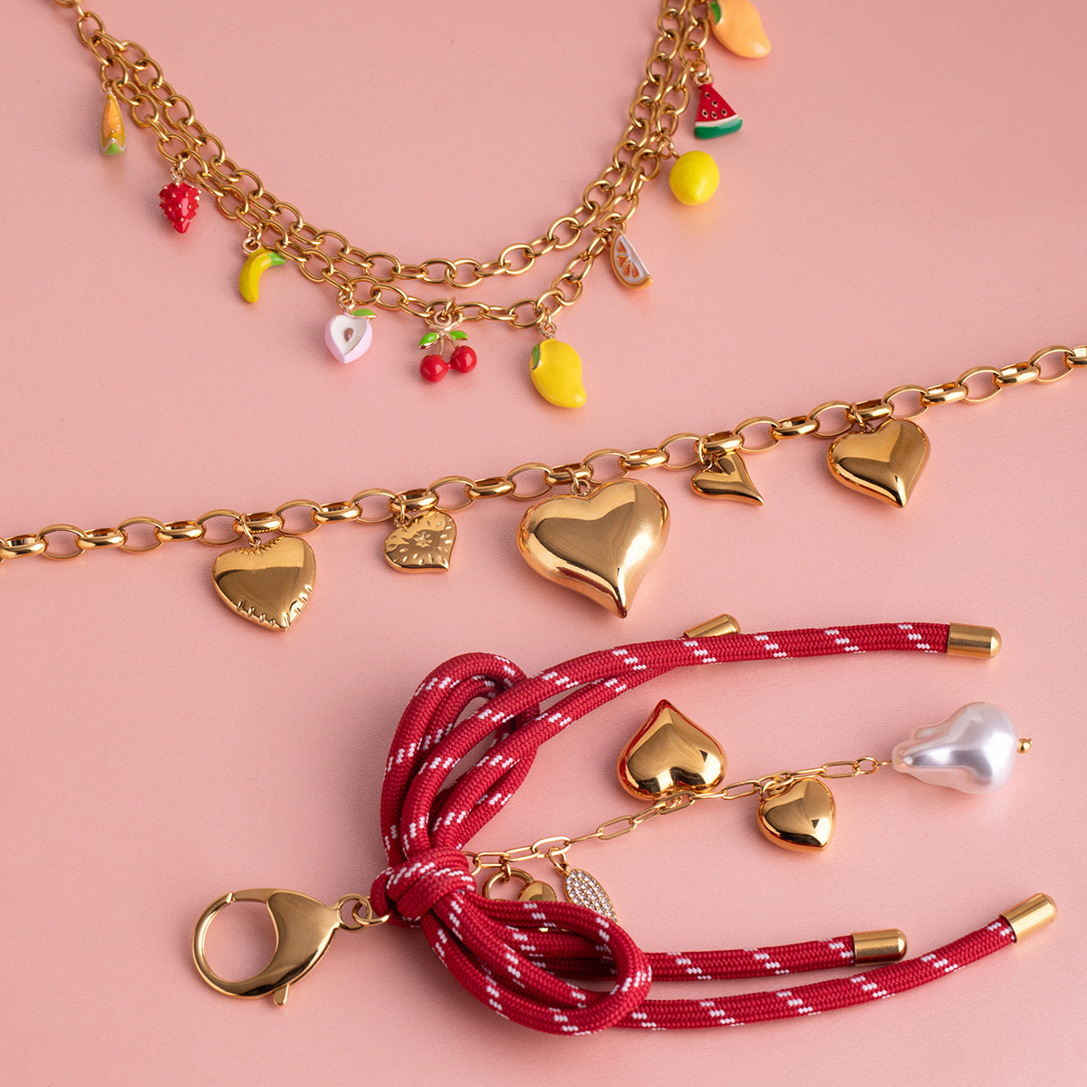 Wanxing Europa y América de alta gama bolso colgante diseño de nicho sentido titanio acero 18 quilates amor dorado fruta cadena colgante joyería de perlas