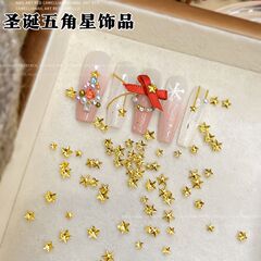 クリスマスの五芒星のネイルアクセサリーの金色のミニは精巧で、平底のドリルは甲の爪の装飾品のドリルを身につけます。