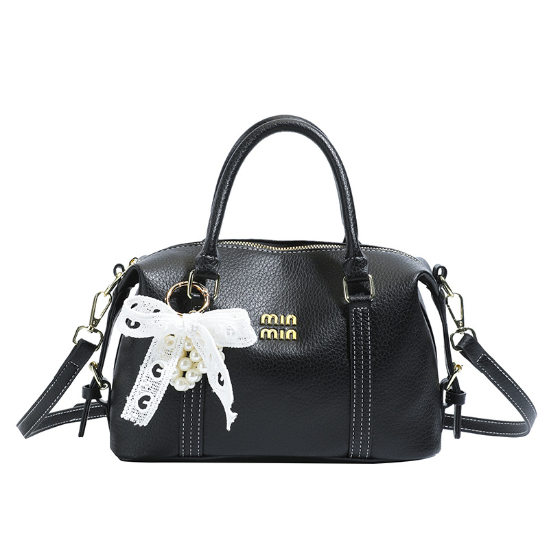 2026 nuevo bolso de bolos de mano de mujer simple sensación cotidiana de nicho de viaje coreano bolso de mujer bolso de almohada