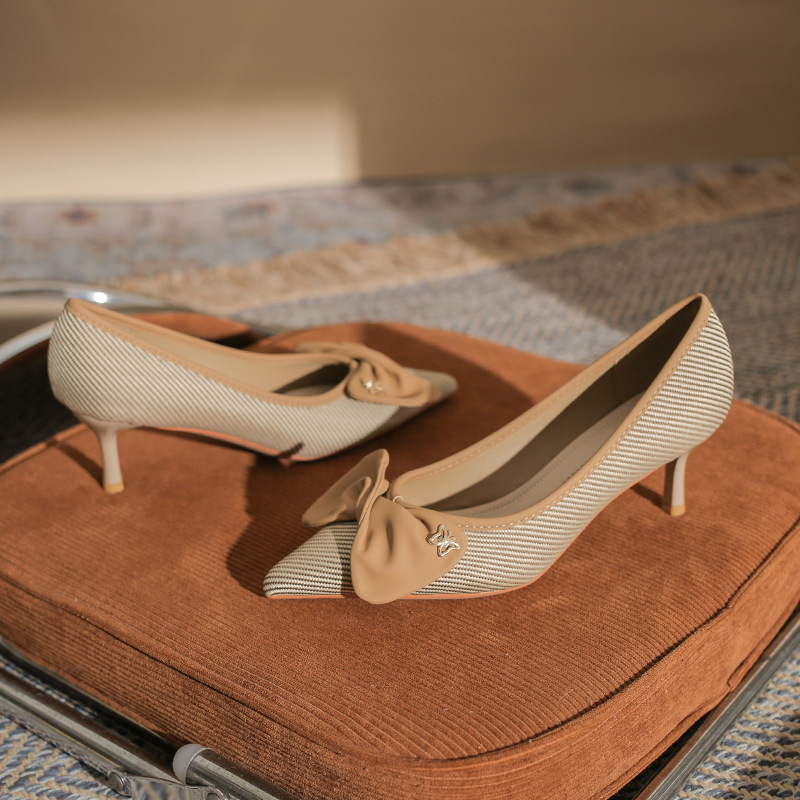 Décolleté donna classiche con fiocco e tacco a spillo elegante_voghion.com