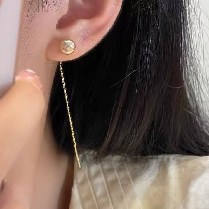 Nuevos cuentas de champagne con bordillos largos, líneas de orejas delgadas, diseño de personalidad simple y sofisticado, auriculares de alta calidad