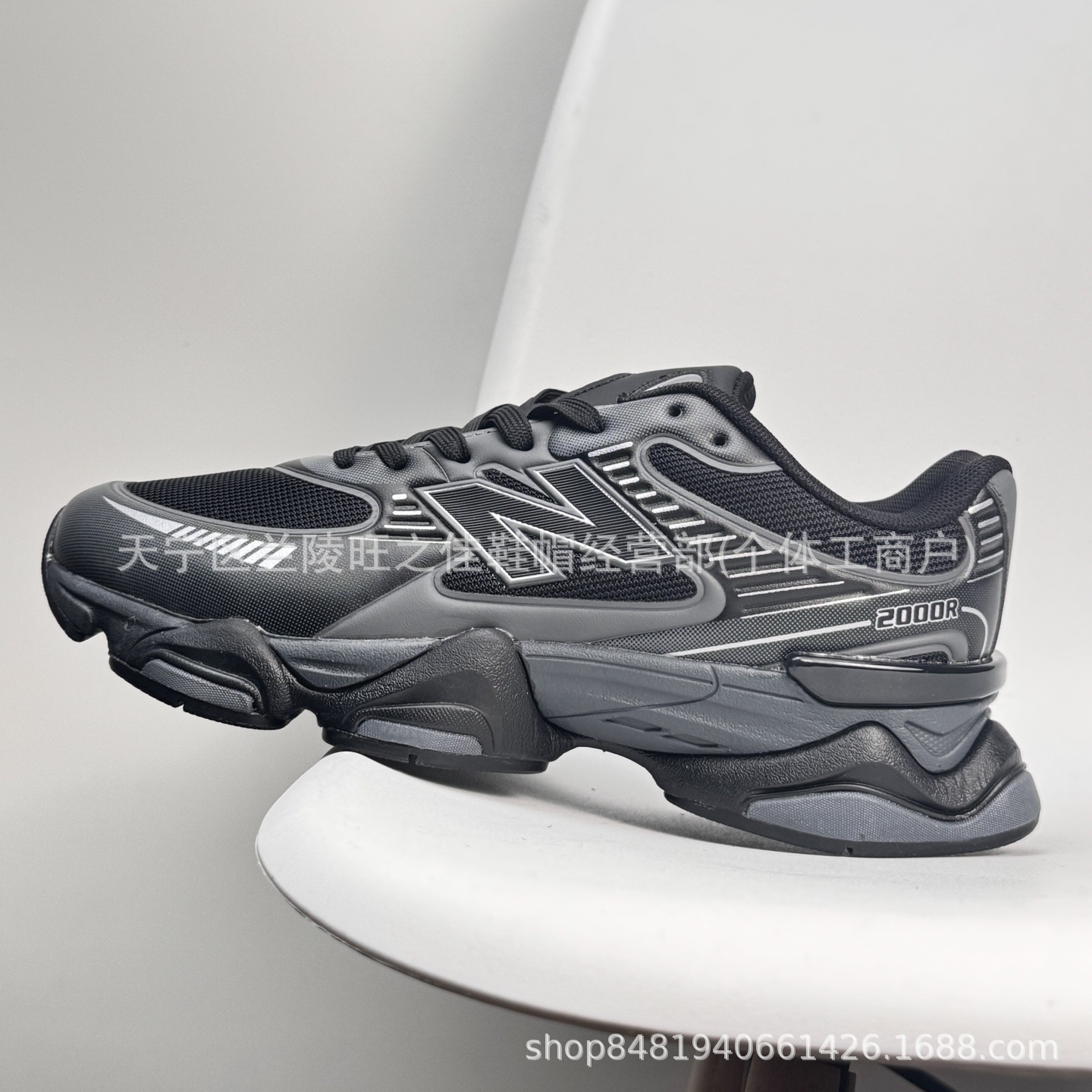Putian NB M2000 serie de moda versátil tela de cuero artificial de cerdo amortiguador antideslizante desgaste zapatillas de correr bajas
