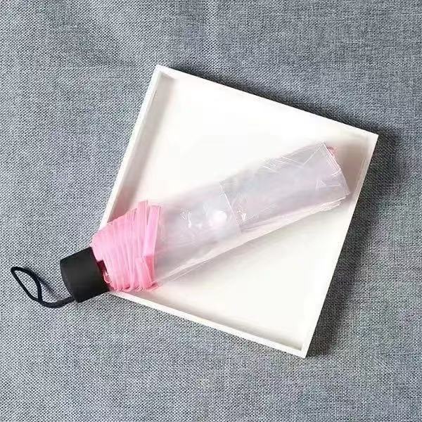 Paraguas transparentes coreanos para mujeres plegables totalmente automáticos tres plegables para estudiantes pequeños frescos lindos dibujos animados engrosados