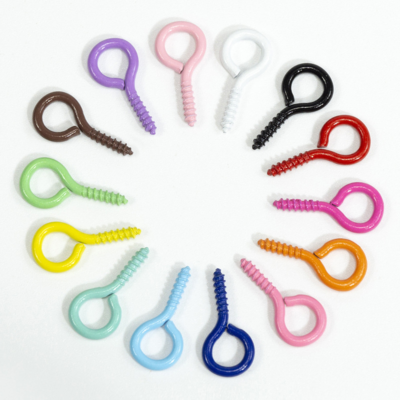 Accesorios de la joyería DIY 100 color spray pintura ovejas cuerno clavo tornillo ojo mirando teléfono caso colgante llavero