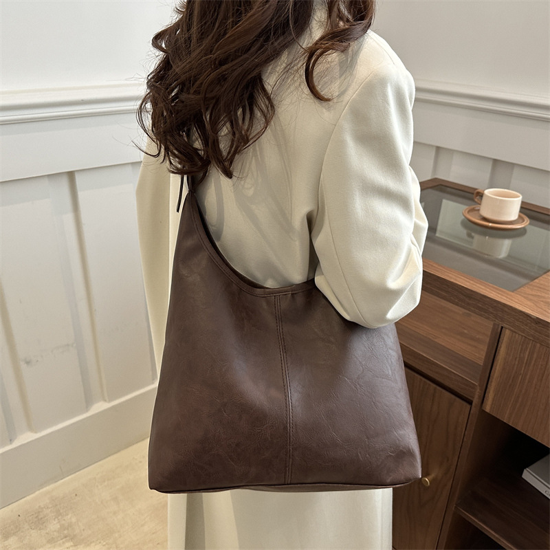2025 primavera nueva moda bolsos de mano de hombro de gran capacidad bolsos tote bolsos de mujer bolsos de viaje bolsos versátiles para mujeres