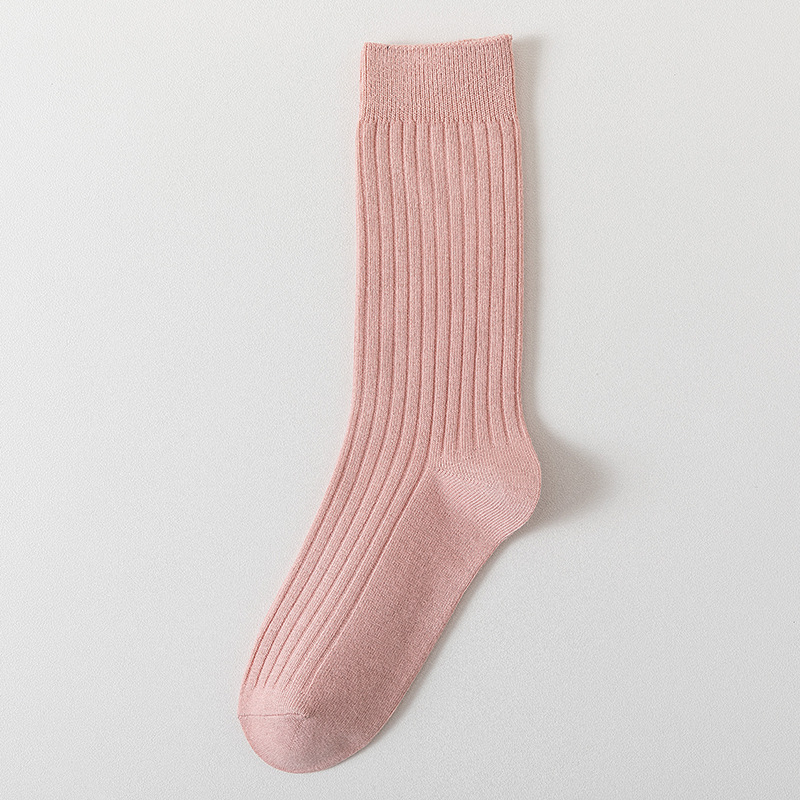 Calcetines de mujer de color sólido calcetines de media pantorrilla de primavera y otoño calcetines de pila de color caramelo de algodón peinado de mujer Zhuji calcetines largos de mujer al por mayor