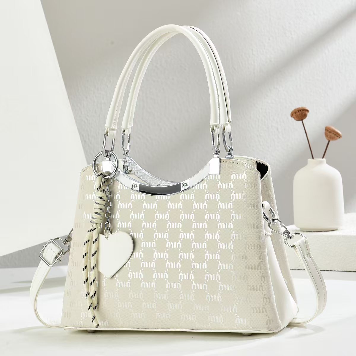 Marca de gran capacidad bolso tote francés nuevo temperamento femenino bolso femenino de moda europea y americana bolso de hombro de viaje de compras de ocio