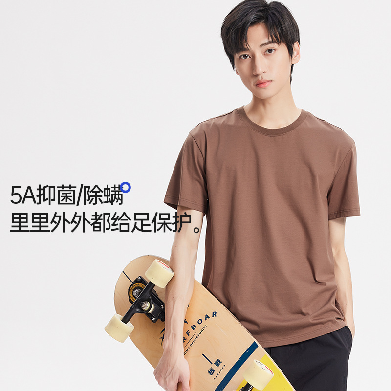 Nueva camiseta fresca de algodón mercerizado de primavera y verano para hombres, pijamas finos de color sólido, cuello redondo transpirable, top de manga corta