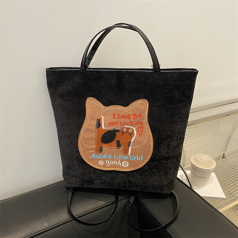 Bagos de gran capacidad para chicas encantadoras otoño / invierno 2024 nuevo estilo retro bolso de hombro de moda alta sensación bolso de brazo